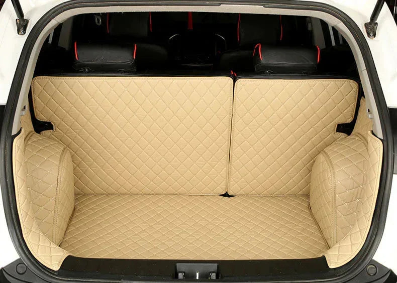 Cream custom trunk mats with quilted pattern in SUV, luxury car interior upgrade