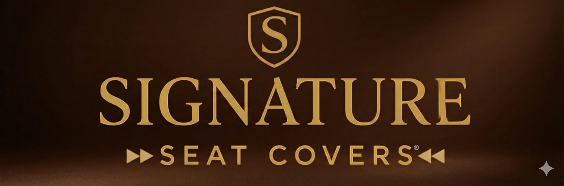 Signature Seat Covers gold logo on brown background, luxury car seat covers branding